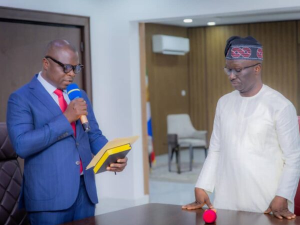 ‎Okpebholo Swears In Momodu as Edo Commissioner, Urges Focus on People’s Interest